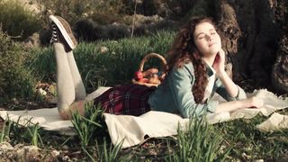 Curly haired Adel C teasing