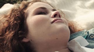 Curly haired Adel C teasing